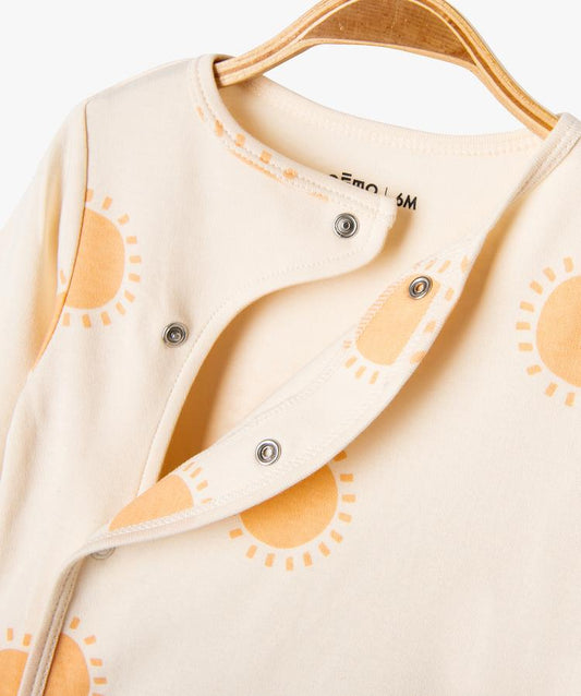 Grenouillère beige avec motif soleil