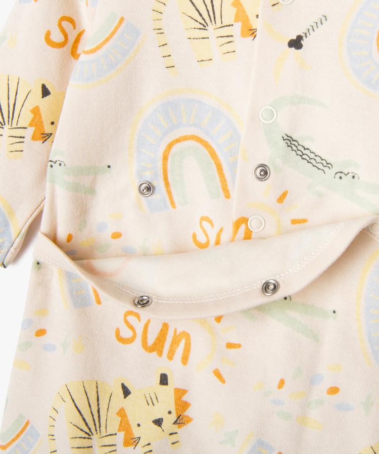 Grenouillère beige à motifs fun