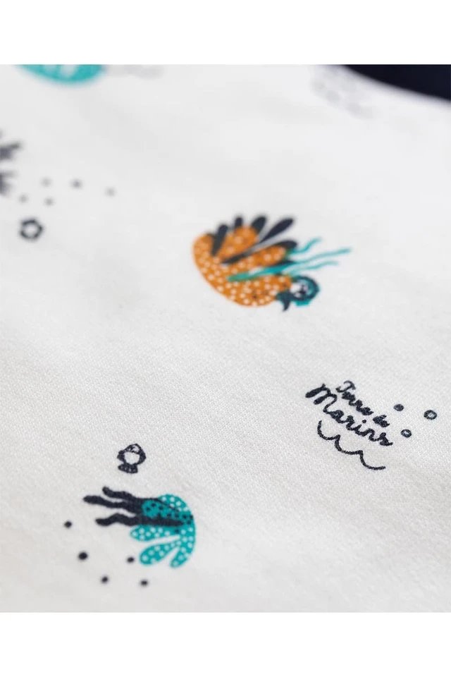 Ensemble sweat et pantalon blanc et bleu marine