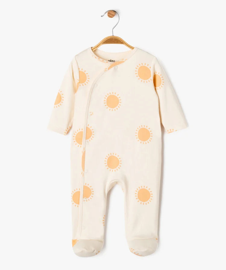 Grenouillère beige avec motif soleil. GÉMO. Filou et Loulou.  Dakar-Sénégal 