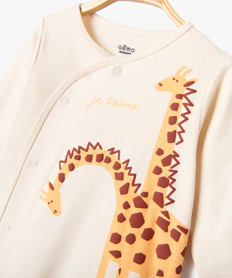 Grenouillère beige motif girage