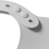 Bavoir Récupérateur ajustable en silicone, gris: Babyono